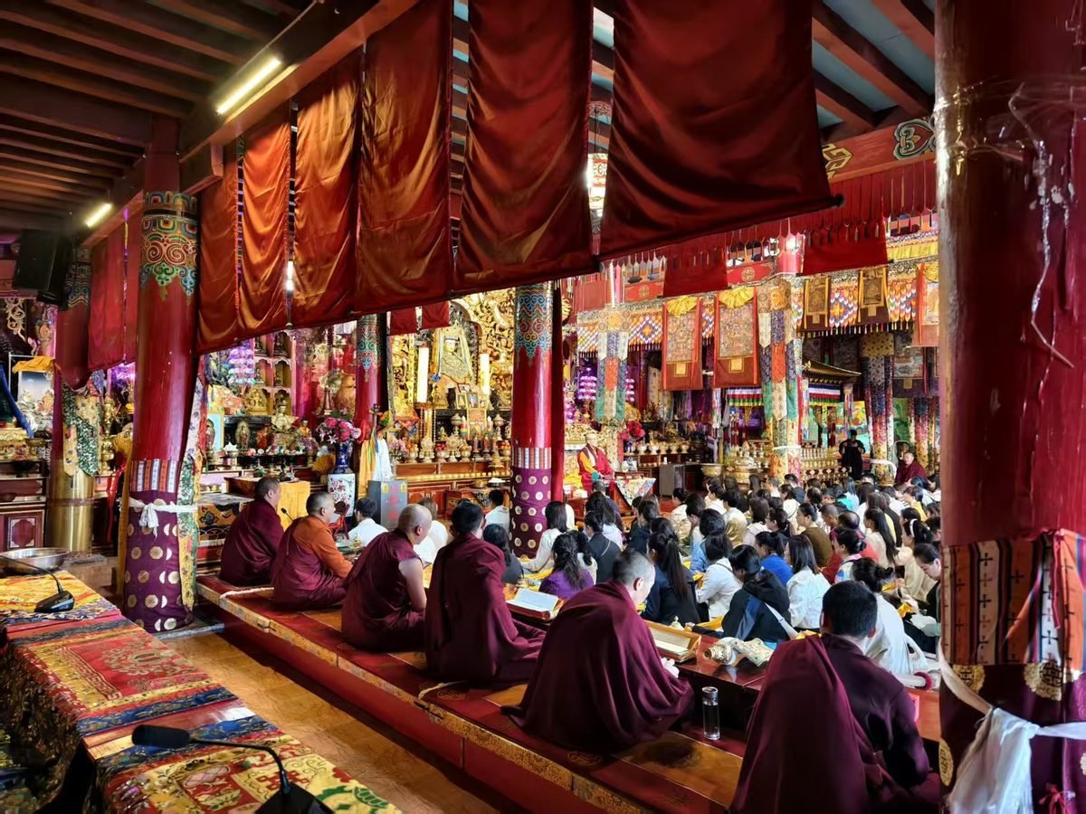 Private blessing ceremony for a corporate group at a Ming-era temple in Lijiang